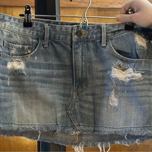 Cute, size 10 mini jean skirt.